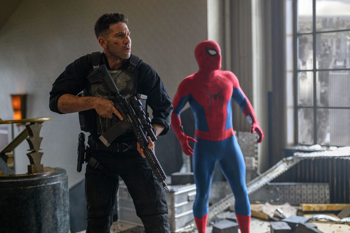 Jon Bernthal as Frank Castle and Tom Holland as Spider-Man in a wrecked office in Spider-Man: Brand New Day